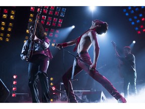 This image released by Twentieth Century Fox shows Gwilym Lee, from left, Rami Malek and Joe Mazzello in a scene from "Bohemian Rhapsody."