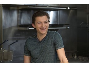 FILE - In this Nov. 12, 2018 file photo, Tom Holland participates in the Cooking with "The Avengers" event at the Simone Restaurant in Los Angeles. Holland received a cooking lesson with "Avengers" co-director Joe Russo and chef Jessica Largey who introduced him to kabocha squash, a delicacy known as Japanese pumpkin.