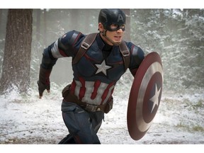 FILE - This file photo provided by Disney/Marvel shows Chris Evans as Captain America/Steve Rogers, in the new film, "Avengers: Age Of Ultron." Evans suggested his run as Captain America is done. The filmmakers controlling the Avengers' fates say he shouldn't shelve the shield just yet.