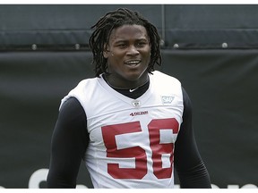 FILE - In this May 30, 2018, file photo, San Francisco 49ers linebacker Reuben Foster walks on the field during a practice at the team's NFL football training facility in Santa Clara, Calif. Foster was arrested Saturday, Nov. 24, at the team hotel on charges of domestic violence.