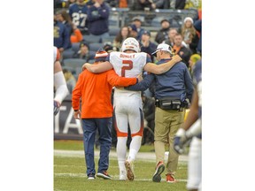 Syracuse quarterback Eric Dungey (2) is helped off the field after he was injured in the first half of an NCAA college football game against Notre Dame, Saturday, Nov. 17, 2018, at Yankee Stadium in New York.