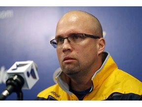 FILE - In this Feb. 1, 2017, file photo, Mike Yeo listens to a question during a news conference after being named the new head coach of the St. Louis Blues in St. Louis.  Early Tuesday, Nov. 20, 2018, Blues general manager Doug Armstrong announced that the team has fired Yeo and named Craig Berube as his interim replacement.