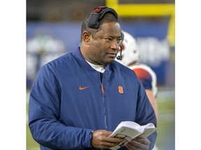 Syracuse head coach Dino Babers watches during an NCAA college football game against Notre Dame, Saturday, Nov. 17, 2018, at Yankee Stadium in New York.