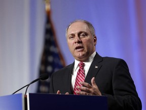 FILE - In a Monday, June 18, 2018 file photo, House Majority Whip Steve Scalise, R-La., speaks at the National Sheriffs' Association convention in New Orleans. After crisscrossing the country to bolster fellow Republicans, Scalise, who was shot at a congressional baseball practice in 2017, squeezed in a publicity tour for his new book about his survival and recovery before returning to work in Congress.