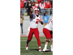 Nebraska quarterback Adrian Martinez throws a pass against Ohio State during the first half of an NCAA college football game Saturday, Nov. 3, 2018, in Columbus, Ohio.