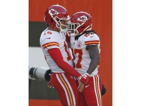 Kansas City Chiefs running back Kareem Hunt (27) celebrates with quarterback Patrick Mahomes (15) after a 50-yard touchdown during the first half of an NFL football game against the Cleveland Browns, Sunday, Nov. 4, 2018, in Cleveland.