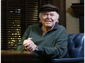 FILE - In this Dec. 15, 2016, file photo, entertainer Roy Clark poses for a photo at his office in Tulsa, Okla. Clark died Thursday, Nov. 15, at his Tulsa home from complications of pneumonia. He was 85. A memorial service is planned for Clark on Wednesday, Nov. 21, 2018, in the Tulsa-suburb of Broken Arrow.