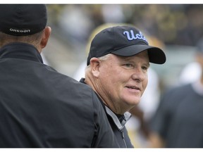 UCLA head coach Chip Kelly roams the field before playing Oregon in an NCAA college football game in Eugene, Ore., Saturday, Nov. 3, 2018
