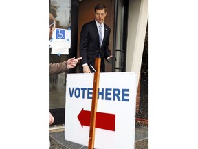 Rep. Conor Lamb, D-Pa, who is running against Rep Keith Rothfus, R-Pa in Pennsylvania's 17th Congressional District, exits his polling place after voting Tuesday, Nov. 6, 2018 in Mt. Lebanon, Pa.