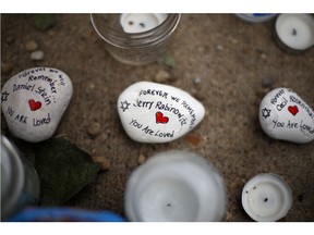 These are stones found on Wednesday, Oct. 31, 2018, part of a makeshift memorial outside the Tree of Life Synagogue to the 11 people killed during worship services Saturday Oct. 27, 2018 in Pittsburgh.