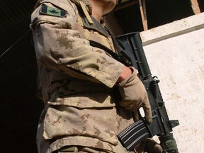 A Canadian soldier of the NATO-led International Security Assistance Force (ISAF) stands guard at the Provincial Reconstruction Team (PRT) premises in the southern city of Kandahar in January 2007.