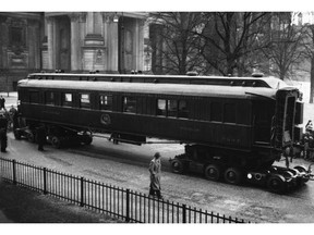 FILE - This March 24, 1941 file photo shows the saloon car of Compiegne, in where the armistice ending World War I was signed on Nov. 11, 1918. The French and German leaders this weekend will jointly visit the remains of the train carriage where the armistice ending World War I was signed on Nov. 11, 1918.  For the French, the dining car became a shrine to peace. For Adolf Hitler, it was a symbol of the humiliation of surrender. The Nazi leader had it dragged to Germany after conquering France in World War II. (AP Photo)