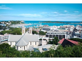 FILE - This Monday May 9, 2018 file photo, shows a general view of the bay of Noumea, the capital of New Caledonia with the Saint Joseph cathedral in foreground and the yachting port in the background. New Caledonia, a French archipelago in the South Pacific, is preparing for an independence referendum upcoming Sunday Nov. 4, 2018, the last step in a three-decades-long decolonization effort.