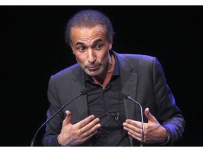 FILE - In this Feb. 7, 2016 file photo, Muslim scholar Tariq Ramadan delivers a speech during a French Muslim organizations meeting in Lille, northern France. The lawyer representing an accuser of prominent Islamic scholar Tariq Ramadan, who was jailed in February amid an investigation into two alleged cases of rape, says he has been released on bail.