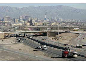 FILE - In this Feb. 12, 2008, file photo, traffic moves along Interstate 15 in Las Vegas. Artificial intelligence is helping improve safety along a stretch of Las Vegas' busiest highways.