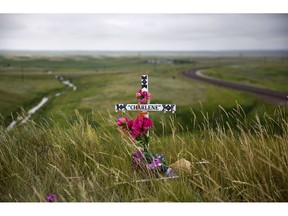FILE--In this July 14, 2018, file photo, a makeshift memorial stands near the scene where Charlene Mancha was murdered by her husband last year on the Blackfeet Indian Reservation in Browning, Mont. A study released by a Native American non-profit says numerous police departments in cities nationwide are not adequately identifying or reporting cases of missing and murdered indigenous women.