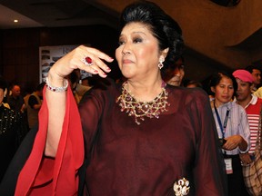 Imelda Marcos arrives at the government-run Cultural Center of the Philippines for a special "gala tribute", held in her honour, in Manila on September 11, 2009.
