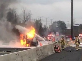 Emergency crews attend a fire after an accident on highway 407, as shown in this still image taken from a video provided by Ontario Provincial Police Sgt. Kerry Schmidt, in Toronto on Wednesday Oct. 31, 2018.