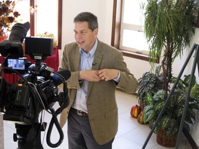 Alaska Democratic gubernatorial candidate Mark Begich prepares for an interview in Anchorage, Alaska, Sunday, Nov. 4, 2018. Begich and Republican Mike Dunleavy are the two major candidates vying to succeed independent Gov. Bill Walker, who ended his campaign in October. Candidates are making their final pitches to voters and working to get Alaskans to the polls with the general election fast approaching.