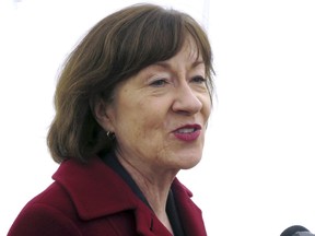 Sen. Susan Collins speaks to the media outside Bath Iron works, where she spoke during a ceremony marking construction of a new warship, Friday, Nov. 9, 2018, in Brunswick, Maine.