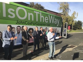 Republican gubernatorial candidate John Cox, right, makes a campaign stop in Sacramento, Calif., Sunday, Nov. 4, 2018.