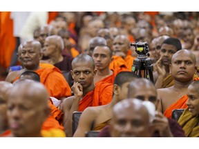 Sri Lankan Buddhist monks supporting ousted prime minister Ranil Wickremesinghe take part in convention held to appeal president Maithripala Sirisena to convene the parliament and restore democracy in Colombo, Sri Lanka, Tuesday, Nov.6, 2018.