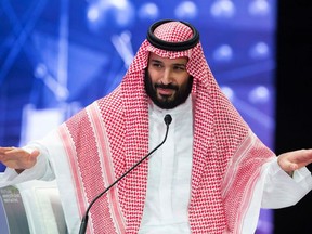 In this Oct. 24, 2018photo released by Saudi Press Agency, SPA, Saudi Crown Prince, Mohammed bin Salman addresses the Future Investment Initiative conference, in Riyadh, Saudi Arabia. Argentine authorities are looking into possible criminal charges against Crown Prince Mohammed bin Salman of Saudi Arabia as he prepares to attend an international summit meeting of world leaders this week in Buenos Aires.