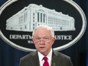In this Oct. 26, 2018, file photo, Attorney General Jeff Sessions pauses before speaking during a news conference at the Department of Justice in Washington.