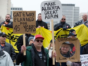 Trans Mountain pipeline supporters demonstrate outside the Alberta Legislature in Edmonton on April 12, 2018.