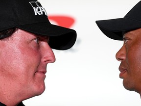 Phil Mickelson and Tiger Woods face-off during a press conference before The Match at Shadow Creek Golf Course on November 20, 2018 in Las Vegas, Nevada.