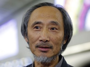 In this Nov. 9, 2018, photo, Chinese dissident writer Ma Jian speaks to media after arriving Hong Kong international airport. Concerns have been raised about freedom of expression in Hong Kong following the cancellation of literary and artistic events and the refusal to allow a Financial Times editor to enter the semi-autonomous Chinese territory. The author Ma Jian is still planning to enter the city amid plans to arrange an alternative venue, while Chinese-Australian artist Badiucao's show was called-off after alleged threats from Chinese authorities. Financial Times' Victor Mallet was turned around at the airport.