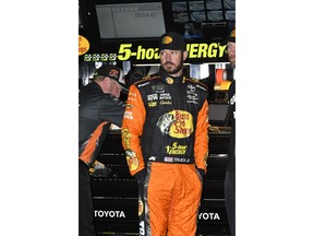 NASCAR Monster Energy Cup Series driver Martin Truex, Jr. stands in the garage area before practice for Sunday's race at Texas Motor Speedway, Saturday, Nov. 3, 2018, in Fort Worth, Texas.