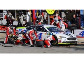 Kevin Harvick's pit crew services his car during a NASCAR Cup auto race at Texas Motor Speedway, Sunday, Nov. 4, 2018, in Fort Worth, Texas.