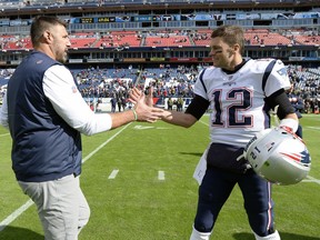 Tennessee Titans head coach Mike Vrabel greets New England Patriots quarterback Tom Brady (12) before an NFL football game Sunday, Nov. 11, 2018, in Nashville, Tenn.