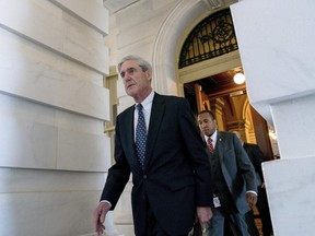 In this June 21, 2017 file photo, former FBI Director Robert Mueller, the special counsel probing Russian interference in the 2016 election, departs Capitol Hill following a closed door meeting in Washington.