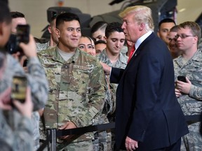 President Donald Trump greets soldiers at Luke Air Force Base in Phoenix, Arizona on October 19, 2018.