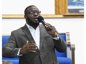 FILE - This Sept. 21, 2017, file photo provided by Harding University in Search, Ark., shows Botham Jean leading worship at a university presidential reception in Dallas. Jean was shot and killed by Dallas police officer Amber Guyger in his apartment in Dallas. The former Dallas police officer has been indicted on a murder charge announced Friday, Nov. 30, 2018. Guyger was arrested days after the Sept. 6 shooting that killed 26-year-old Jean, who was from the Caribbean island nation of St. Lucia.