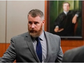 FILE - In this June 13, 2018, file photo, Terry Thompson, accused of fatally choking John Hernandez, is shown in court in Houston. A jury on Monday, Nov. 5, convicted Thompson, the husband of a former sheriff's deputy, of murder for the strangulation death of a man the couple confronted outside a Houston-area restaurant.