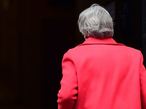 Theresa May, U.K. prime minister, arrives back at 10 Downing Street after answering questions in parliament on the Brexit agreement in London, U.K., on Thursday, Nov. 15, 2018.