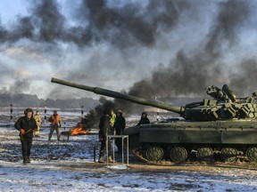Ukrainian servicemen attend a military training in Chernihiv region, Ukraine, Wednesday, Nov, 28, 2018. Russia and Ukraine traded blame after Russian border guards on Sunday opened fire on three Ukrainian navy vessels and eventually seized them and their crews. The incident put the two countries on war footing and raised international concern.