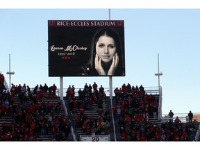 A photograph of University of Utah student and track athlete Lauren McCluskey, who was fatally shot on campus is projected on the video board before the start of an NCAA college football game between Oregon and Utah Saturday Nov. 10, 2018, in Salt Lake City.