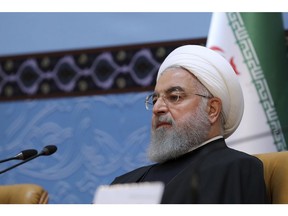 In this photo released by official website of the office of the Iranian Presidency, President Hassan Rouhani attends an annual Islamic Unity Conference in Tehran, Iran, Saturday, Nov. 24, 2018. Rouhani has called Israel a "cancerous tumor" established by Western countries to advance their interests in the Middle East. (Iranian Presidency Office via AP)