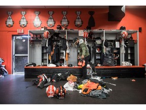 B.C. Lions running back Jeremiah Johnson cleans out his locker after an end of season meeting at the CFL football team's practice facility, in Surrey, B.C., on Tuesday November 13, 2018.