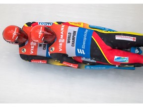 Germany's Toni Eggert and Sascha Benecken race down the track during a Luge World Cup doubles event in Whistler, B.C., on Friday November 30, 2018.