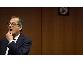 Italian Finance Minister Giovanni Tria waits for the start of a meeting of eurozone finance ministers at the EU Council building in Brussels, Monday, Nov. 19, 2018.