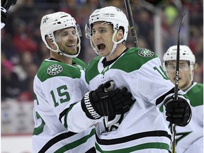 Dallas Stars center Tyler Pitlick, right, celebrates his goal with left wing Blake Comeau (15) during the first period of an NHL hockey game against the Washington Capitals, Saturday, Nov. 3, 2018, in Washington.