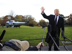 President Donald Trump speaks to the media before leaving the White House in Washington, Tuesday, Nov. 20, 2018, to travel to Florida, where he will spend Thanksgiving at Mar-a-Lago.