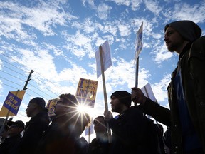 Students rally in support of free speech at Wilfrid Laurier University in Waterloo, Ont., on Nov. 24, 2017.