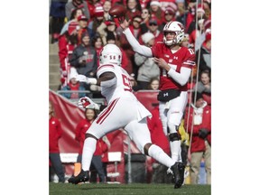 Wisconsin's Jack Coan throws during the second half of an NCAA college football game against Rutgers Saturday, Nov. 3, 2018, in Madison, Wis.