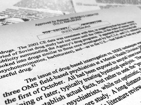 A portion of a once-classified CIA report that disclosed the existence of a drug research program dubbed "Project Medication" is photographed in Washington, Tuesday, Nov. 13, 2018. Shortly after 9/11, the CIA considered using a drug that might work like a truth serum and force terror suspects to give up information about potential attacks. After months of research, the agency decided that a drug called Versed, a sedative often prescribed to reduce anxiety, was "possibly worth a try." But in the end, the CIA decided not to ask government lawyers to approve its use. The American Civil Liberties Union fought in court to have the report released.